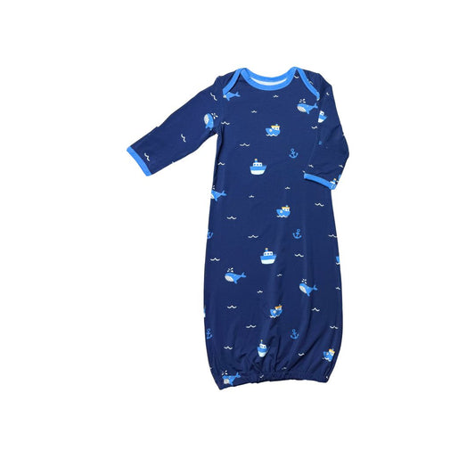 Baby gown with tugboat and whale pattern on dark blue background