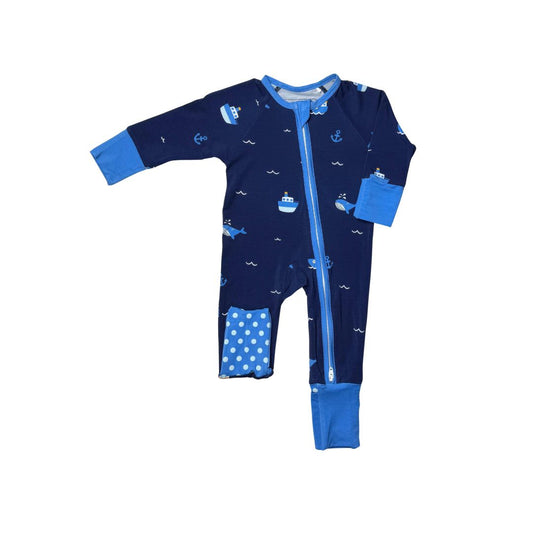 Baby pajamas with tugboat and whale pattern