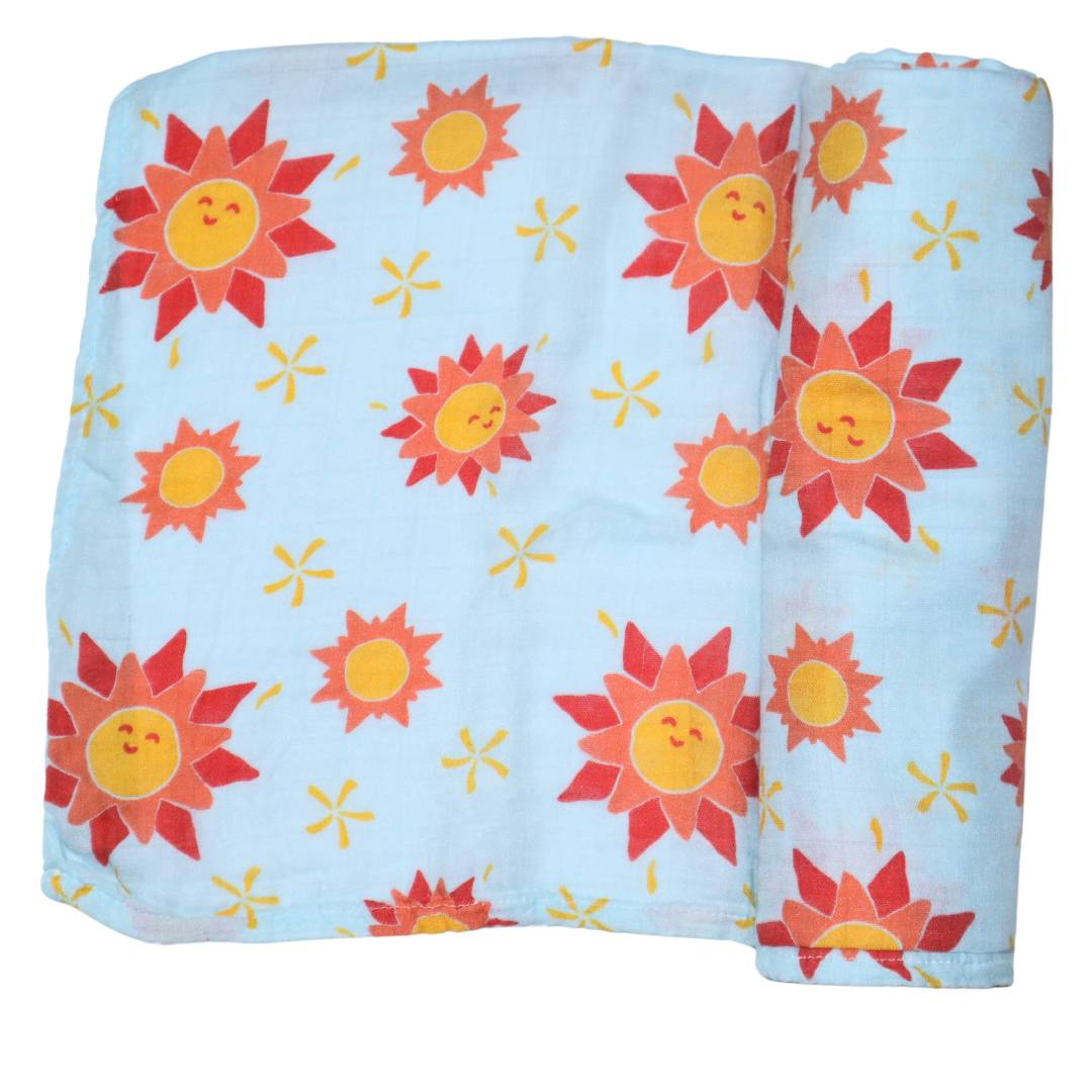 Swaddle blanket with sunshine and baby blue background print.