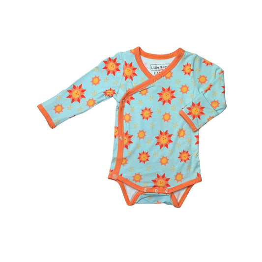 Baby onsie with sunshine pattern