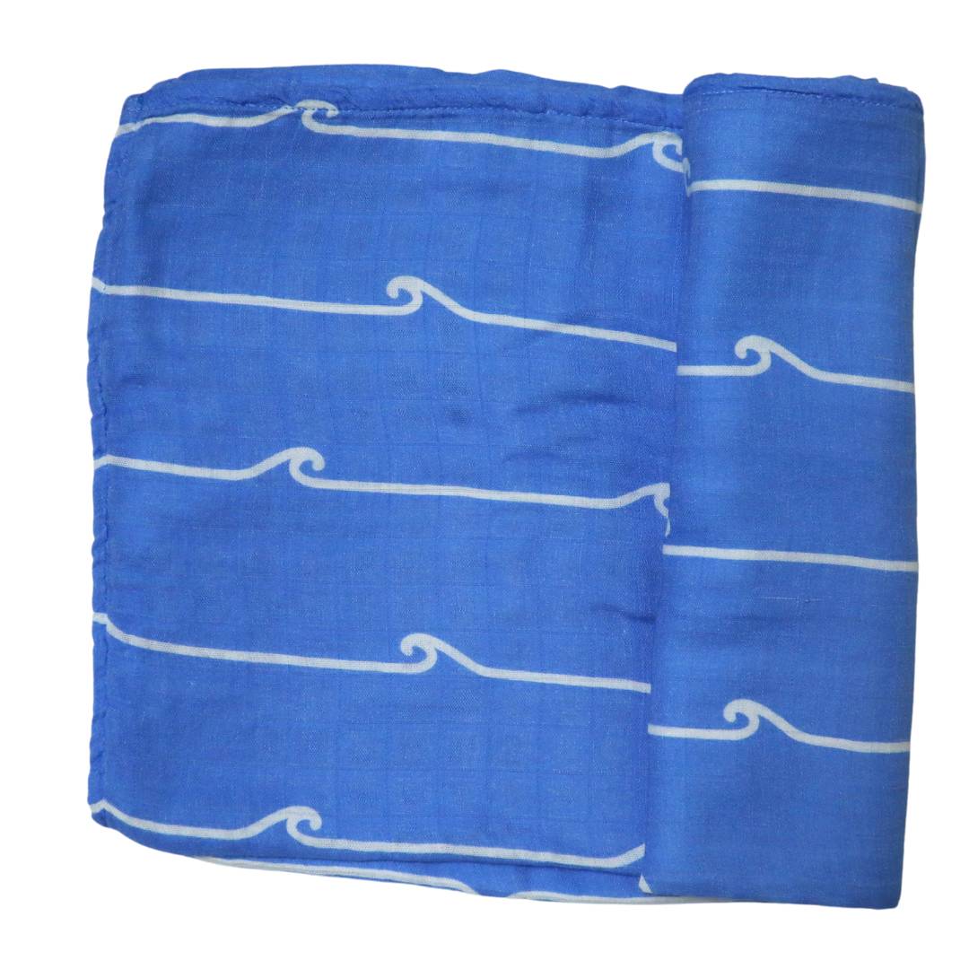 Baby swaddle blanket with ocean wave print.