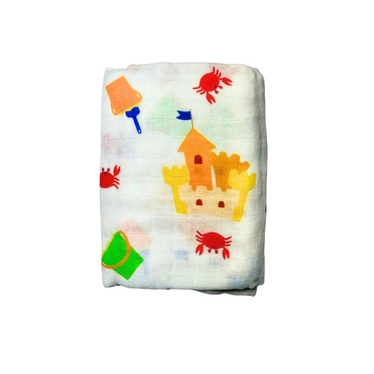 Swaddle blanket with sandcastle and buckets pattern